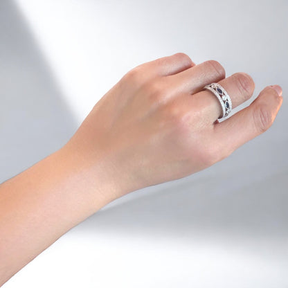 Model wearing a Sterling Silver Blue Sapphire Eternity Ring