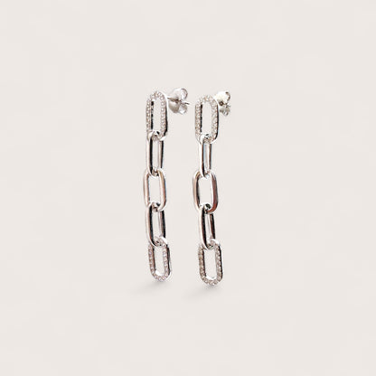 Pair of sterling silver cz chain-link earrings on a light gray background