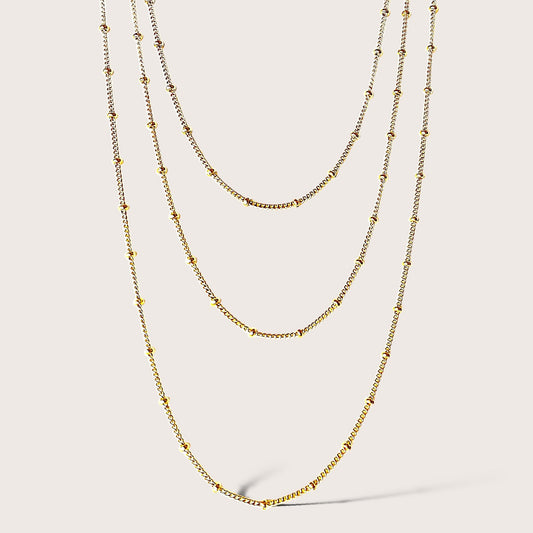 Discover a new level of elegance with our Gold Station Bead Chain Necklace. This stunning piece features a delicate design with dainty beads evenly spaced out that adds a touch of sophistication to any outfit. Crafted with high-quality materials, it's the perfect accessory for any occasion.&nbsp;