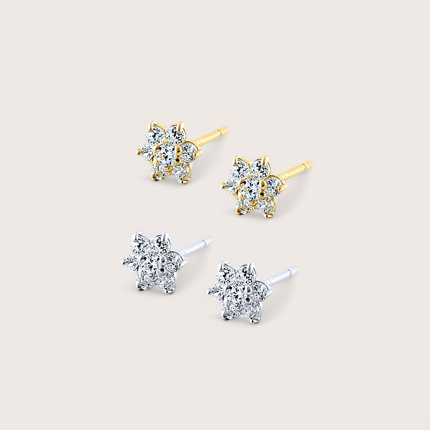 Diamond flower studs shown in two material options 