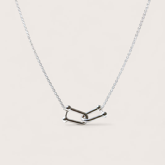 Silver necklace with a unique interlocking U link charms