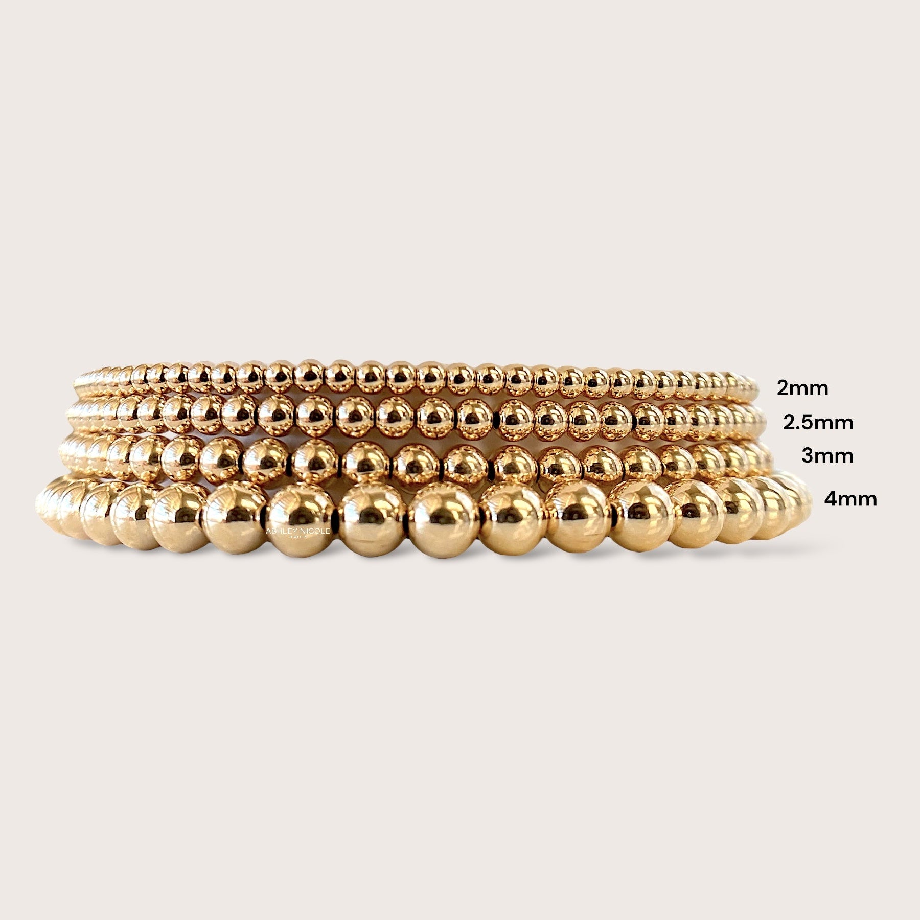 14k gold filled beaded bracelets, shown in 2mm, 2.5mm, 3mm, and 4mm bead widths.