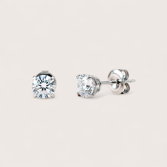 Close up of GRA Certified Rhodium Sterling Silver Moissanite Earrings for Men or Women two size options: 

5mm (1.00CTW) – Each earring features a 0.50ct (DEW) moissanite, ideal for a timeless, understated sparkle.

6mm (1.60CTW) – Each earring features a 0.80ct (DEW) moissanite, offering a bolder, more luxurious presence.
