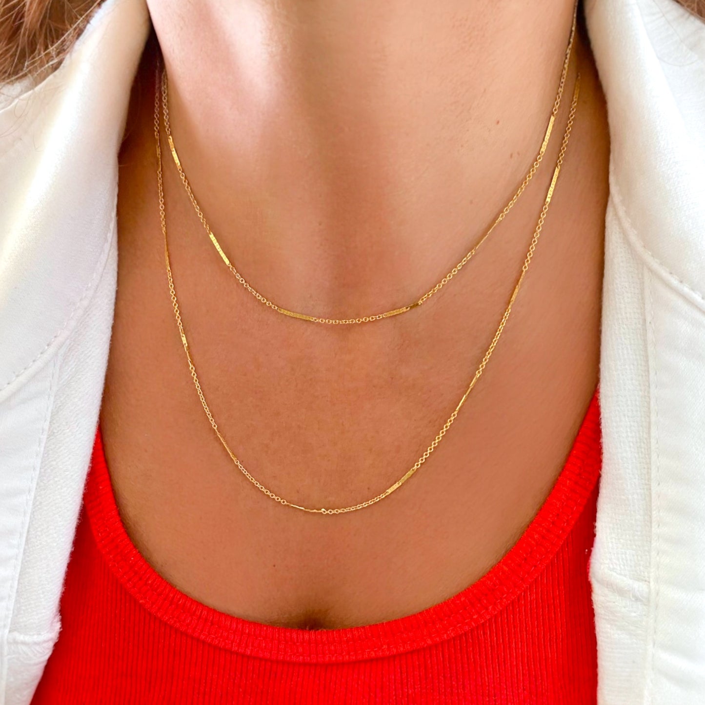 14K Gold Filled Bar Station Chain Necklace on model showing dainty dapped bar links layered 