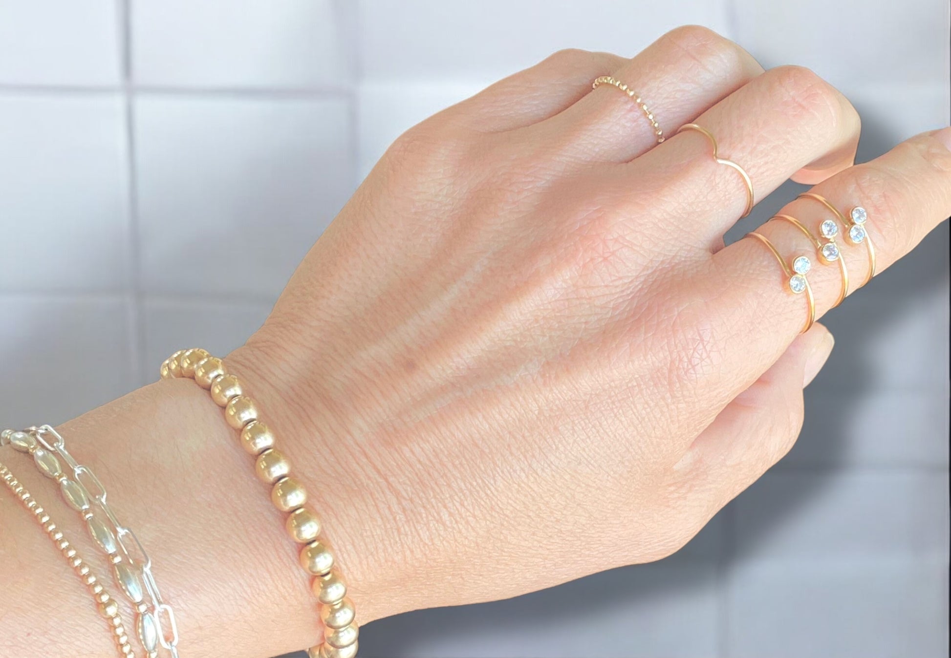 model wearing 14k Gold Ball Chain Ring