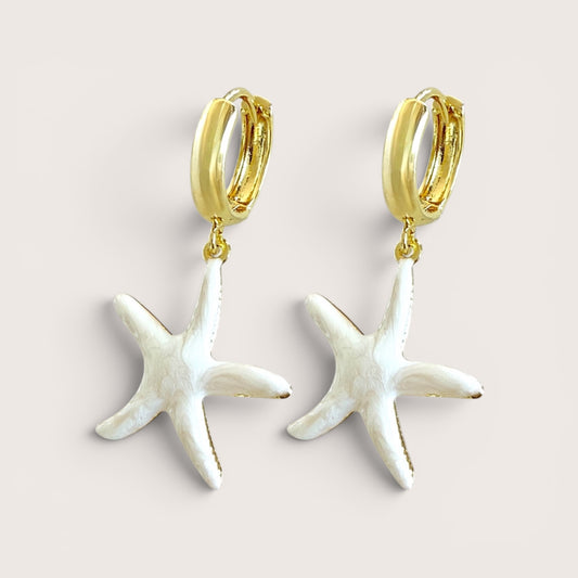 Close up of Gold Starfish Huggie Hoop Earrings with hand-painted Opalescent White Pearl, Fun Sea Life Dangle Earrings