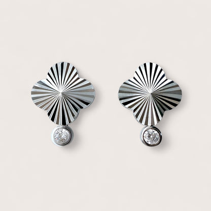 Pair of sterling silver four leaf clover stud earrings with rhodium plating