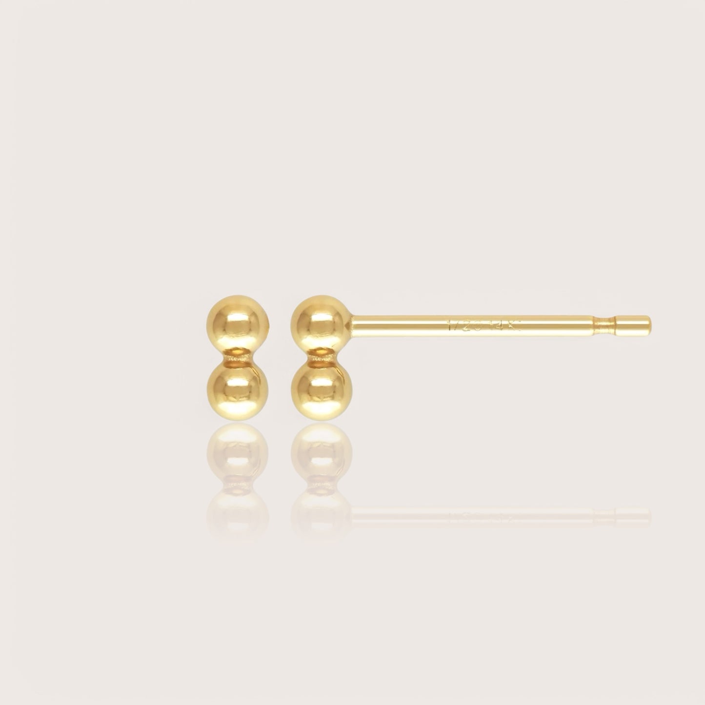 The most versatile addition to any jewelry collection, these exquisite duo-ball studs can be worn individually or in combination with other styles. Available in Sterling Silver and 14K Gold Filled, these studs are crafted from sustainable materials, 100% recycled and 100% hypoallergenic.&nbsp;