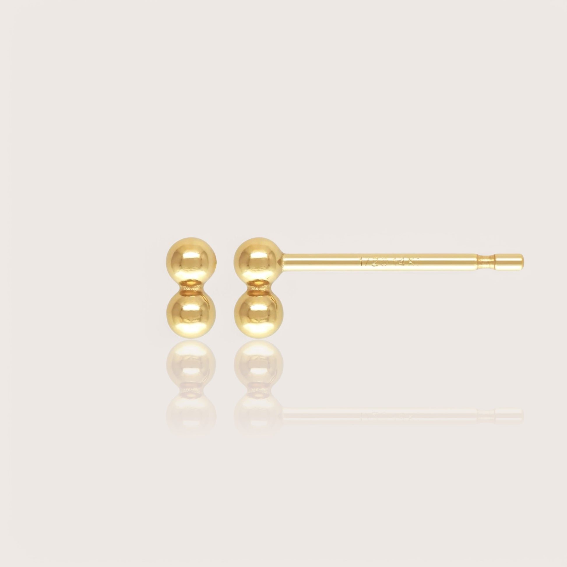 The most versatile addition to any jewelry collection, these exquisite duo-ball studs can be worn individually or in combination with other styles. Available in Sterling Silver and 14K Gold Filled, these studs are crafted from sustainable materials, 100% recycled and 100% hypoallergenic.&nbsp;