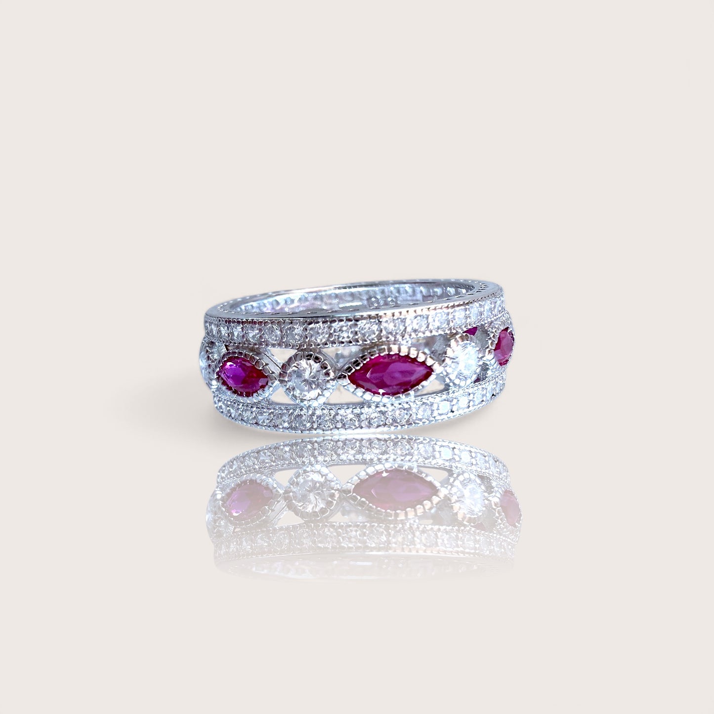 Close up of Sterling Silver Pink Sapphire Eternity Bands