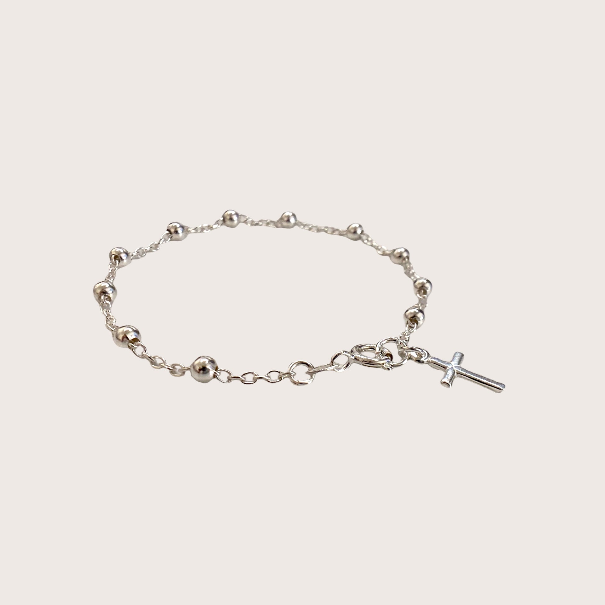 Side view Silver Rosemary Chain Bracelet with a Cross