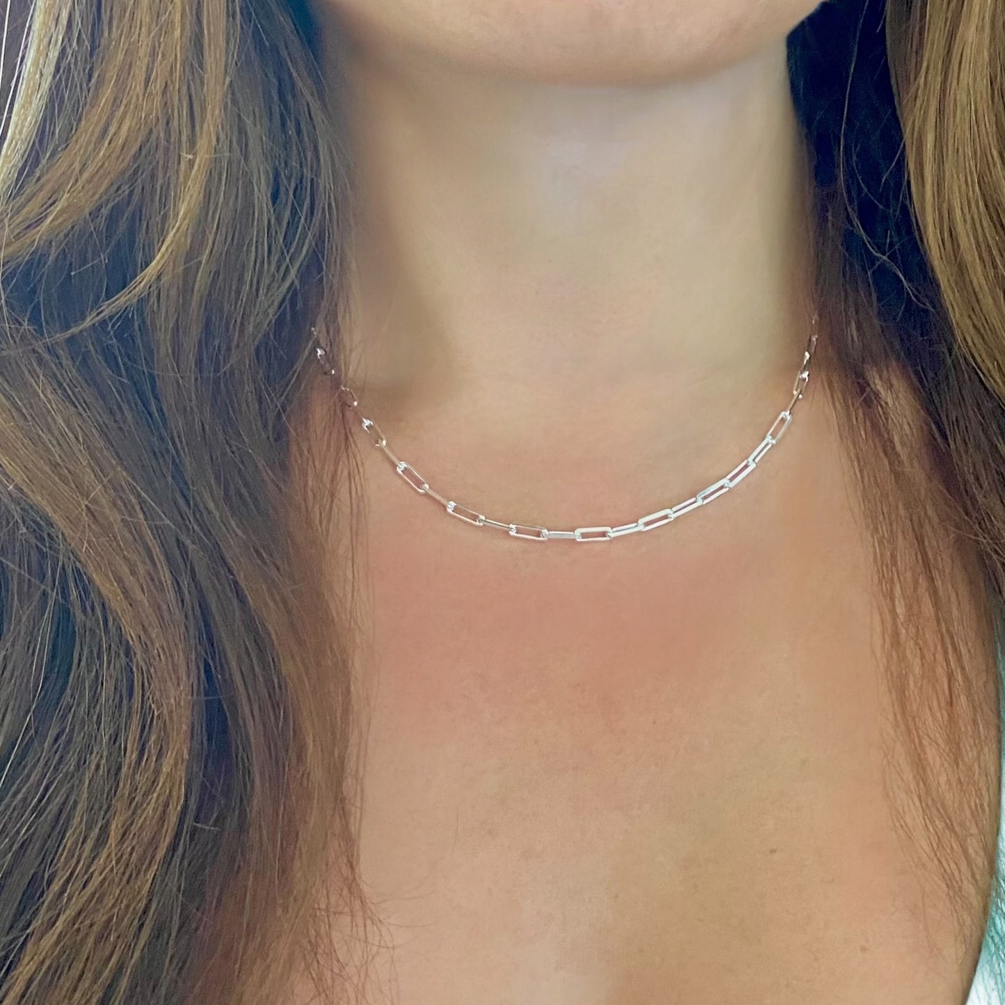 Small Silver Paperclip Link Necklace on a model 