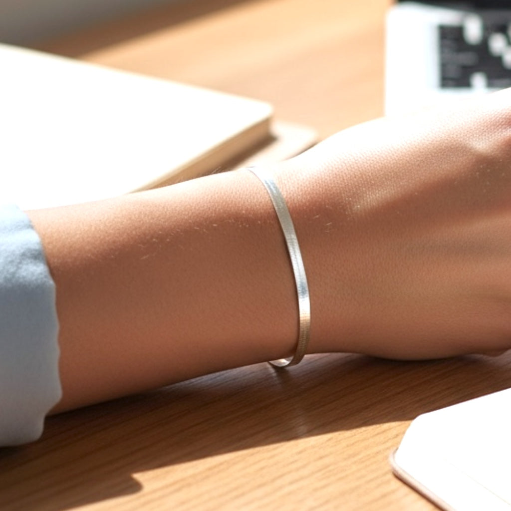 925 Silver Herringbone Bracelet shown on a wrist