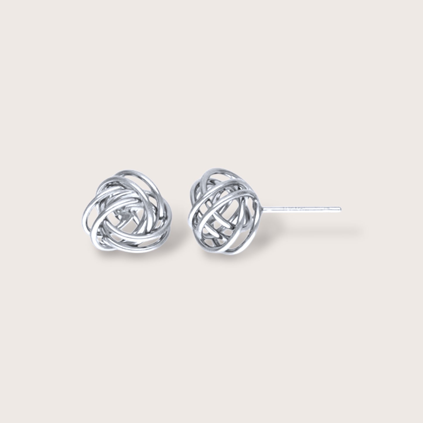 Close up of a pair of sterling silver love knot earrings - showing front facing and side angles.