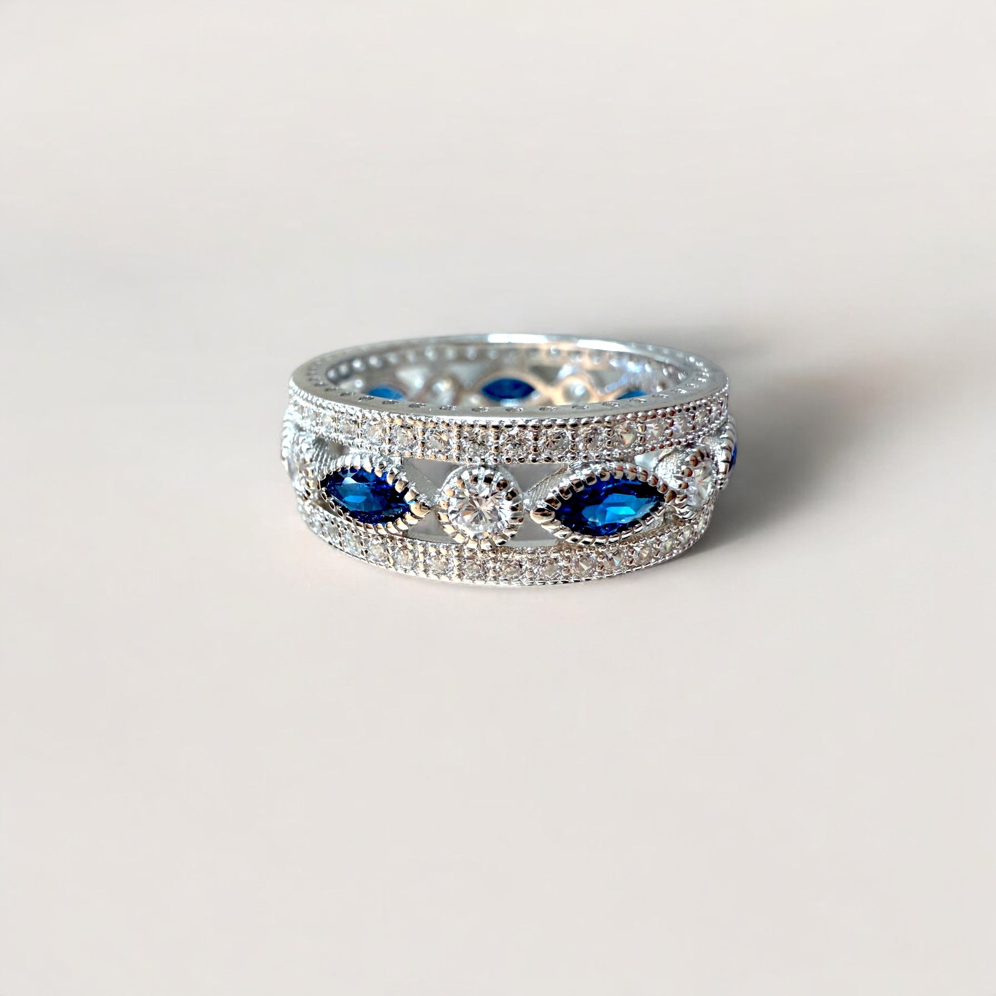 Close up of a Sterling Silver Blue Sapphire Eternity Ring