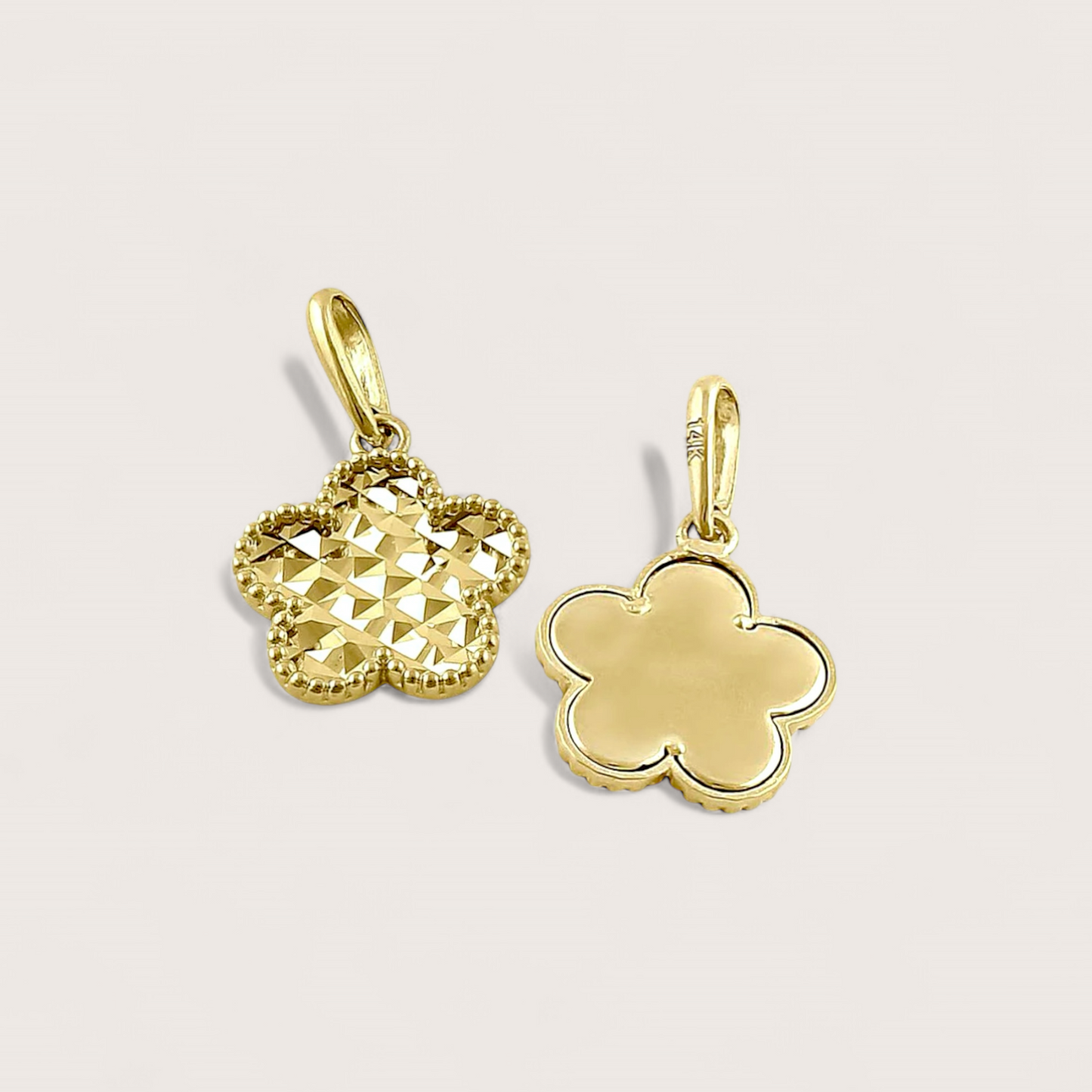 Solid 14k gold clover charm showing front side, back side and 14K authenticity stamp
