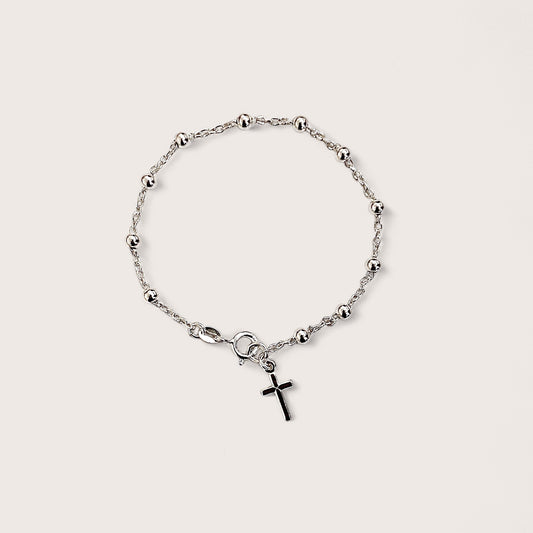 Enhance your spiritual and fashionable attire with this exquisite rosary bead bracelet crafted from 925 sterling silver. The bracelet features a delicate Christian cross pendant, elegantly crafted and finished in lustrous sterling silver.