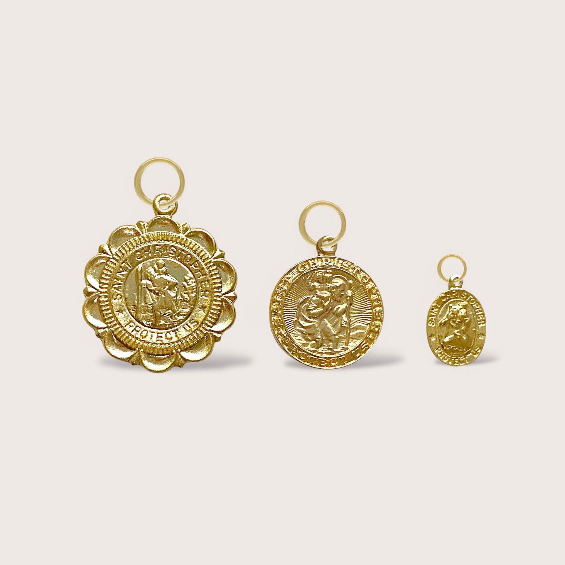 Our exquisite Saint Christopher pendants are a symbol of safe travels, crafted with water-safe and non-tarnishing 14K Yellow Gold Filled materials. Available in small, medium, and large sizes, these hypoallergenic pendants are perfect for all your adventures, making for a unique and meaningful accessory. Keep Saint Christopher close during your journeys, whether near or far.