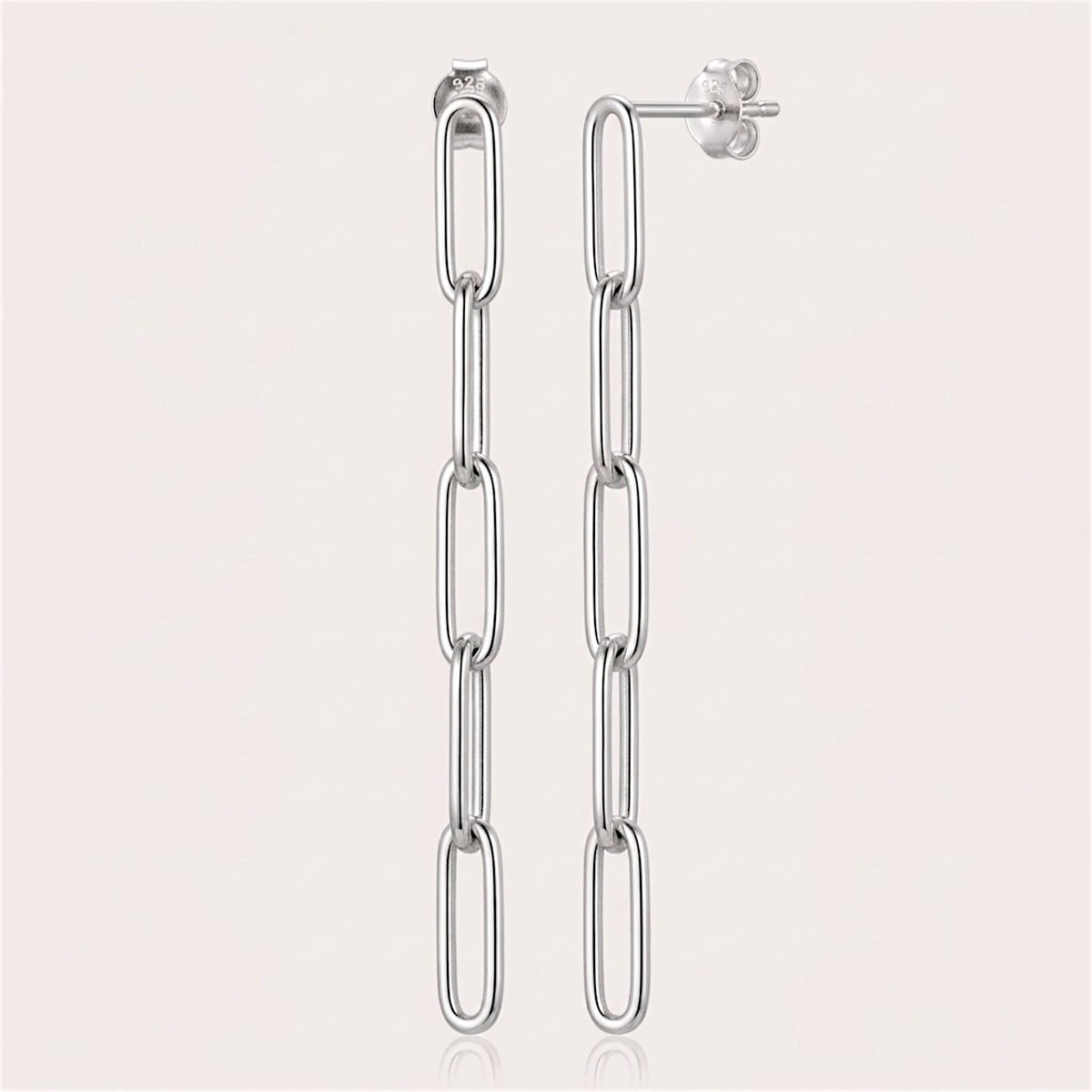 Pair of sterling silver five-link paperclip dangle earrings shown upright, with a stud post and butterfly back visible.