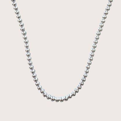 close-up of 5mm 925 sterling silver beads with mirror polished finish — solid Italian silver bead necklace
