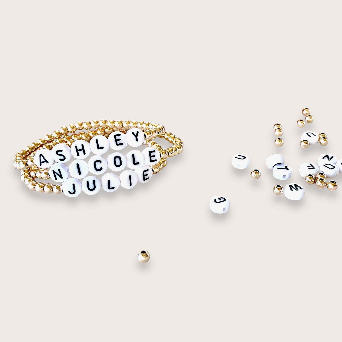 Stretch beaded bracelets with 14K Gold Filled Beads and White Letter Beads