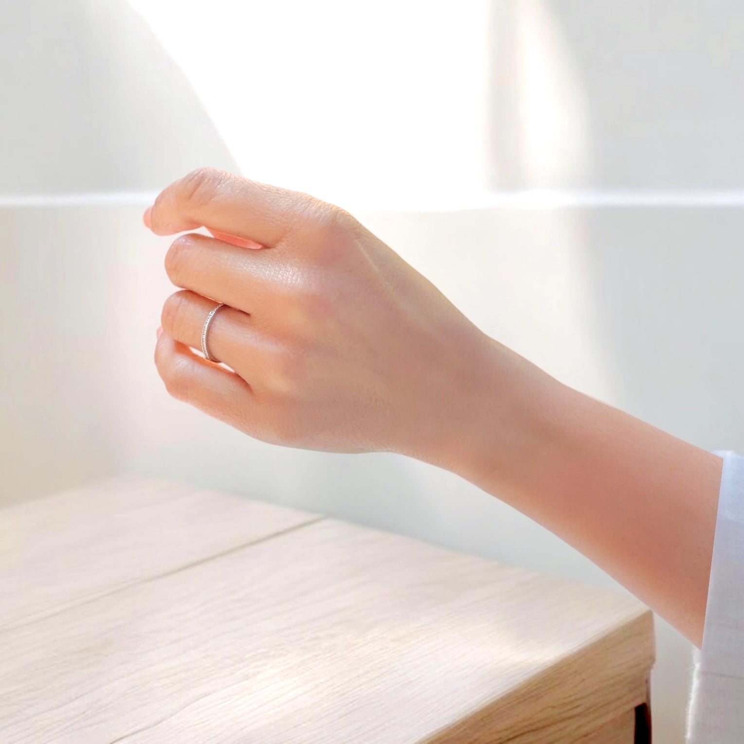 Model wearing a Sterling Silver Swarovski Crystals Eternity Ring