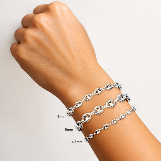Three widths of the high polish 925 solid sterling silver puffed mariner anchor chain bracelet displayed together by Ashley Nicole Jewelry