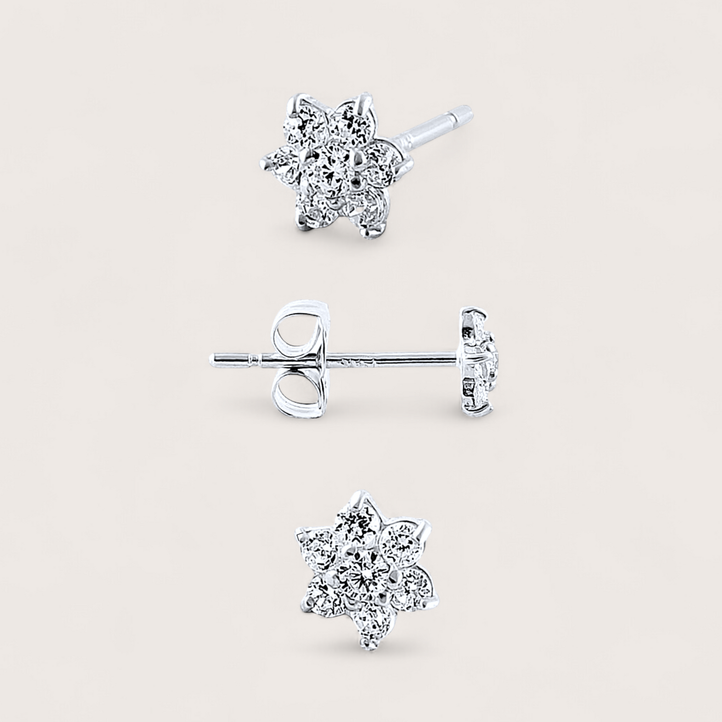 Various angles shown of  14K white gold diamond flower stud earrings, 4.2mm earrings