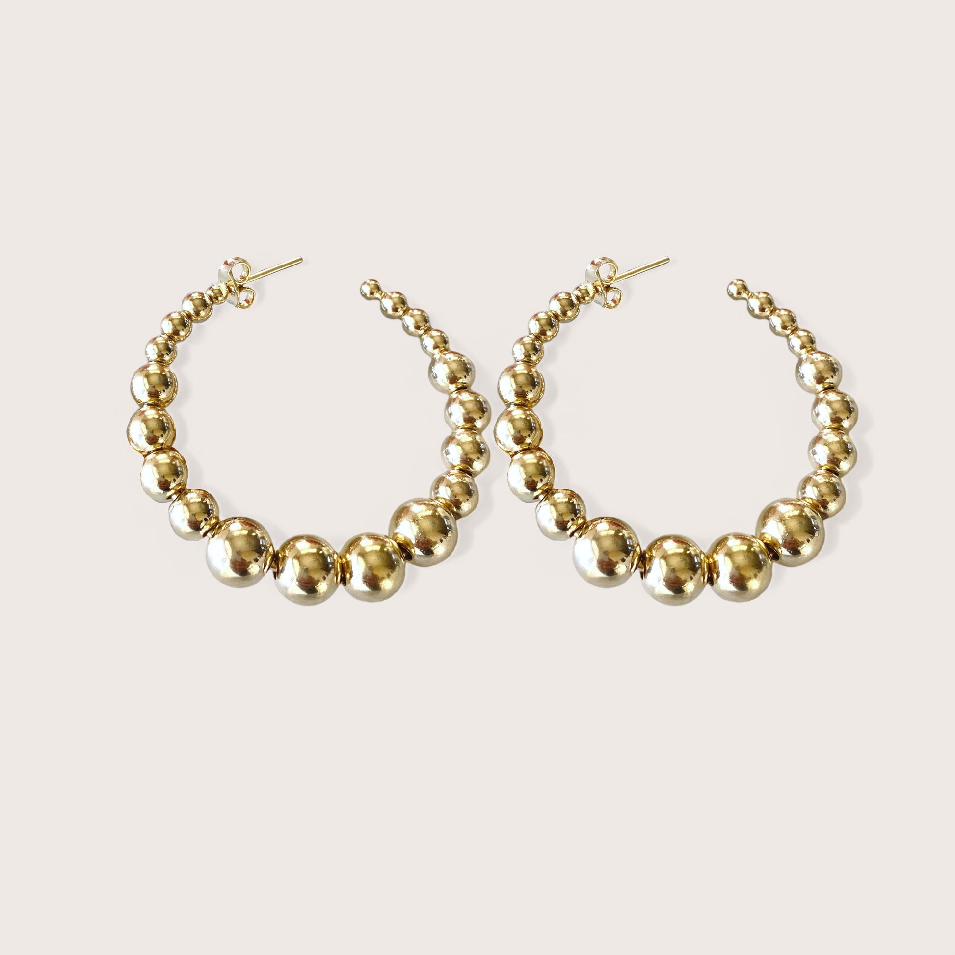 Gold Beaded Hoops on model