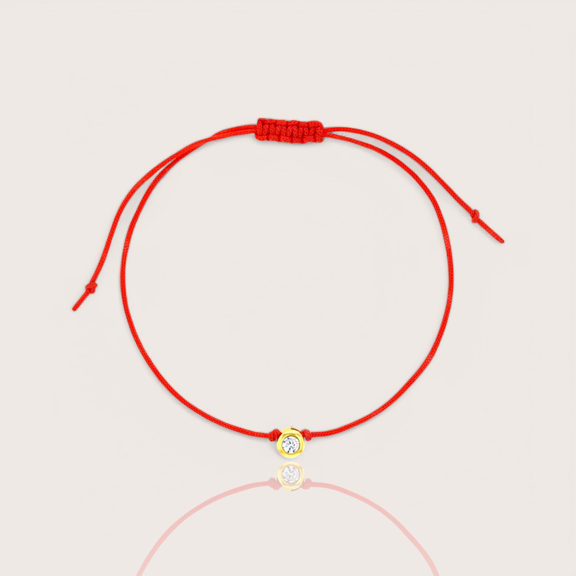 14K gold red string bracelet with tiny clear round CZ charm for kids and teens, adjustable lucky charm jewelry by Ashley Nicole Jewelry