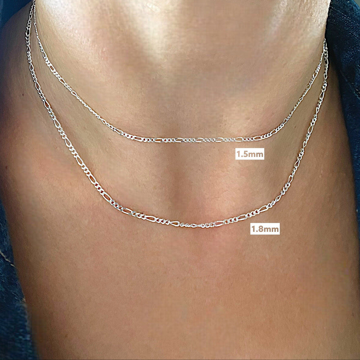 Sterling Silver Figaro Chains in a bright 925 silver, model is wearing the 1.5mm and 1,8mm wide chains for reference. 