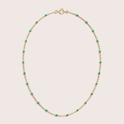 Emerald green enamel station beads spaced along a gold-filled necklace