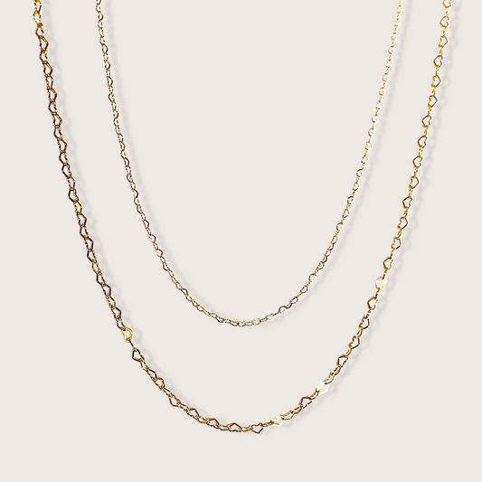Gold Filled Heart Shaped Linked chain necklaces featuring two width options. 