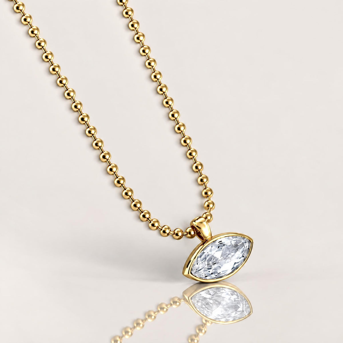 East-West Bezel Solitaire Marquise Cut Pendant Necklace