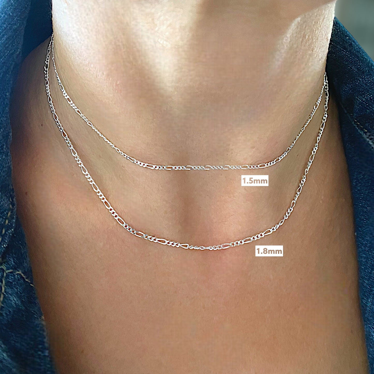Sterling Silver Figaro Chains in a bright 925 silver, model is wearing the 1.5mm and 1,8mm wide chains for reference. 