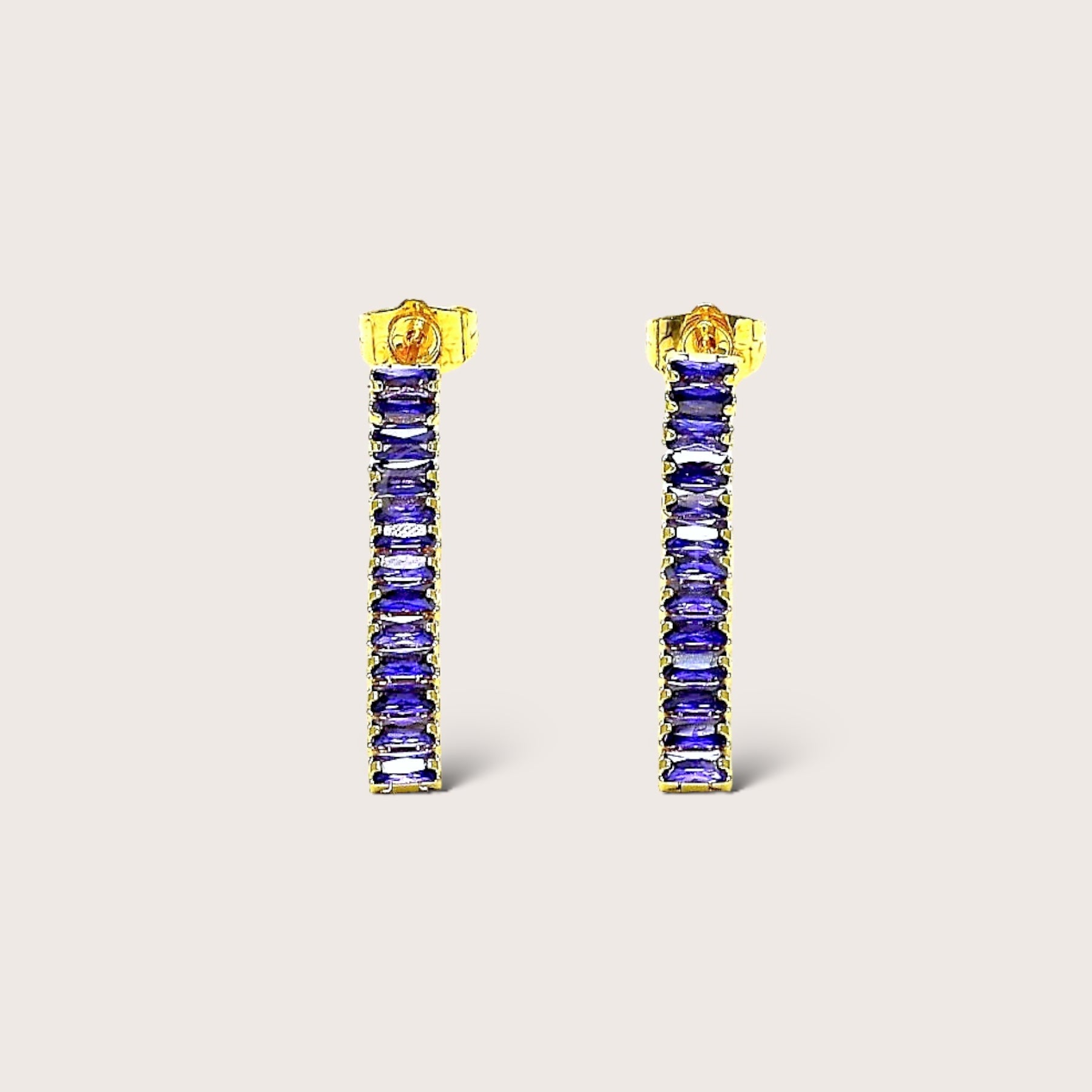 1 Pair of Amethyst Dangle Earrings featuring Amethyst Baguette CZ Gemstones in a gold Finish