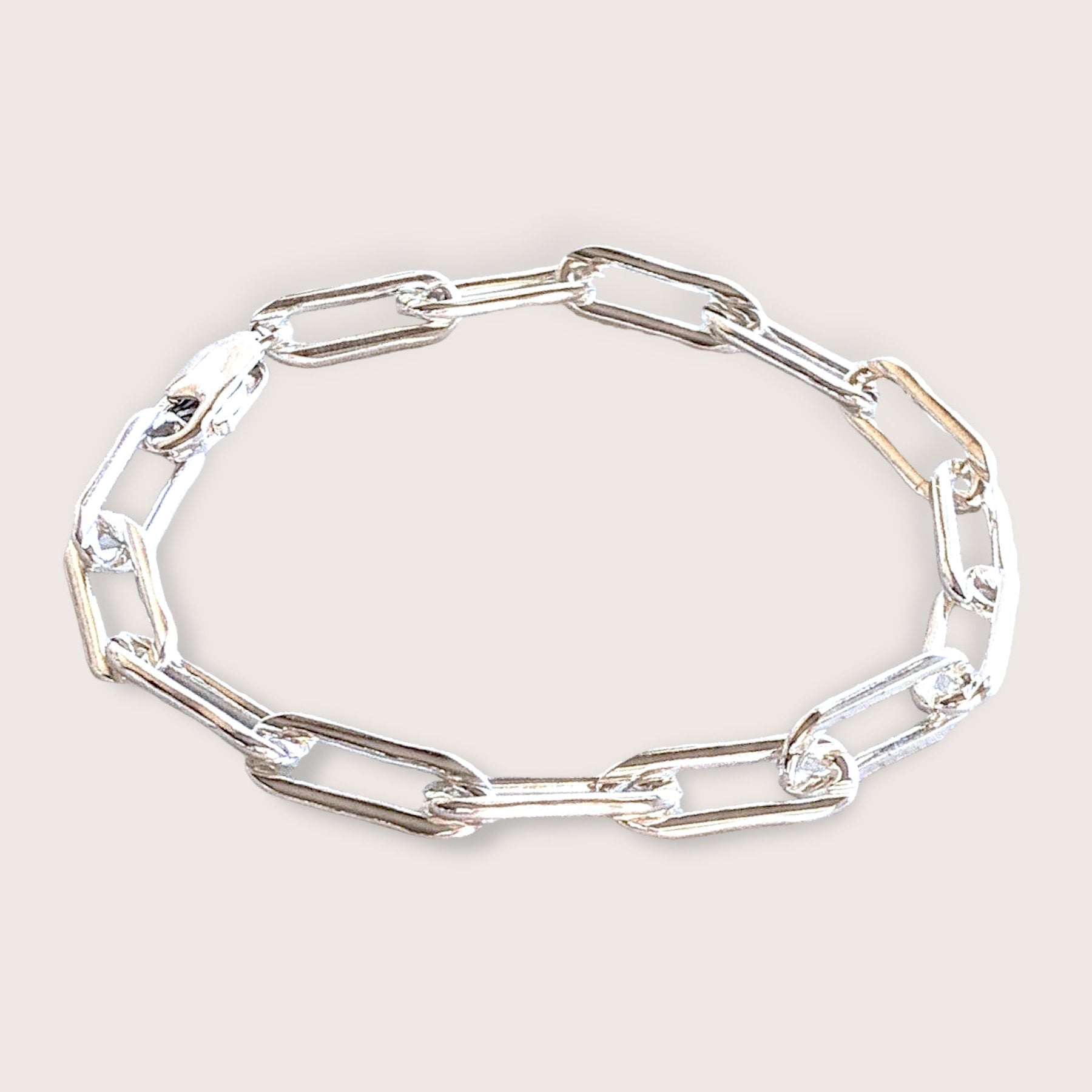 Solid 925 Sterling Silver Paperclip Chain Bracelet, Necklace (not hollow, not plated, genuine 925 Italy Silver). Women's, Men's Silver Chains

This exquisite Elongated Rectangle Cable Chain is designed for durably and great for everyday wear. The shiny long oval links are made with a luxurious Italian silver and a sturdy large lobster clasp for easy on/off. Truly a jewelry box must-have staple. Perfect for layering or stacking with other chains or worn as a standalone piece.