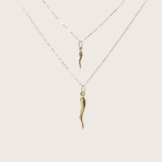 Solid 14K yellow gold large Italian horn cornicello pendant necklace on white background