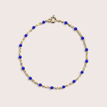 Kids cobalt-blue enamel bracelet with evenly spaced round beads and a gold-filled chain