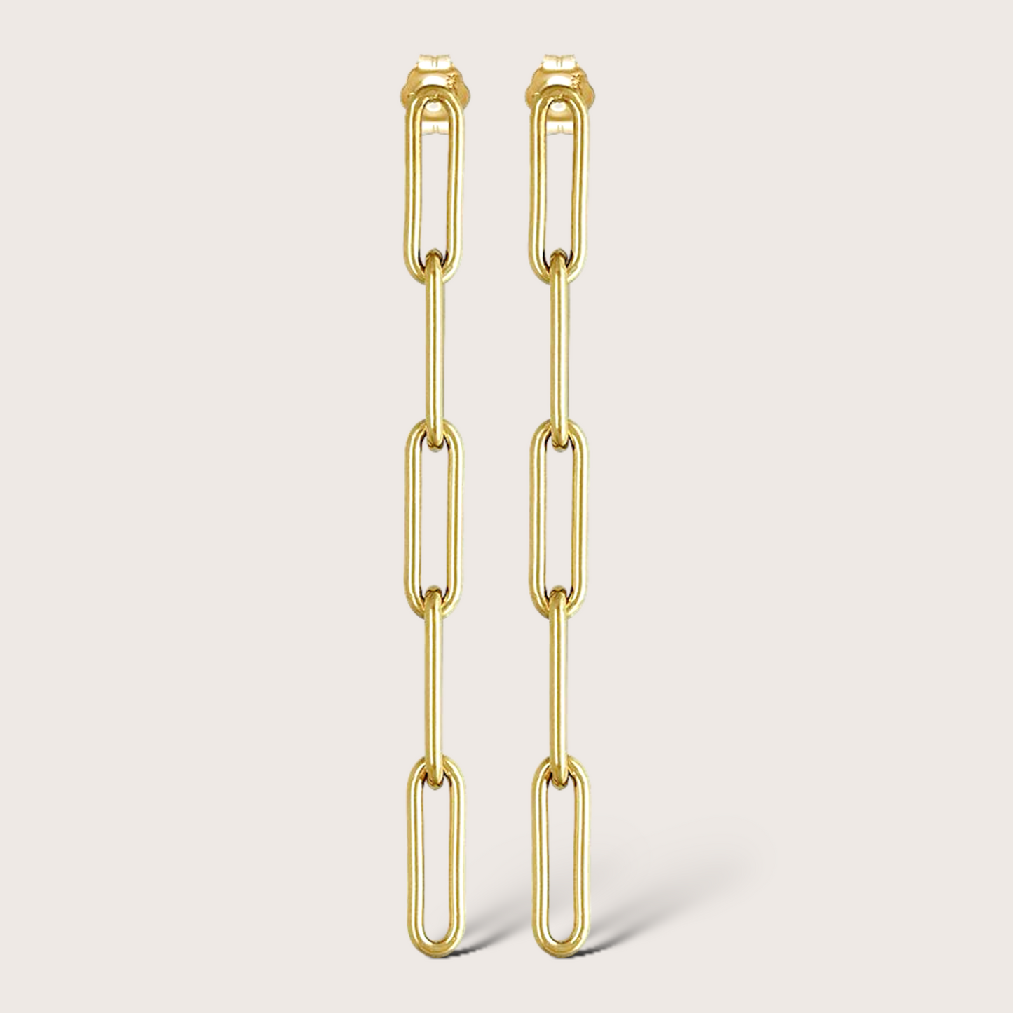 Modern 5-link paperclip dangle stud earrings shown in 14K gold filled by Ashley Nicole Jewelry.