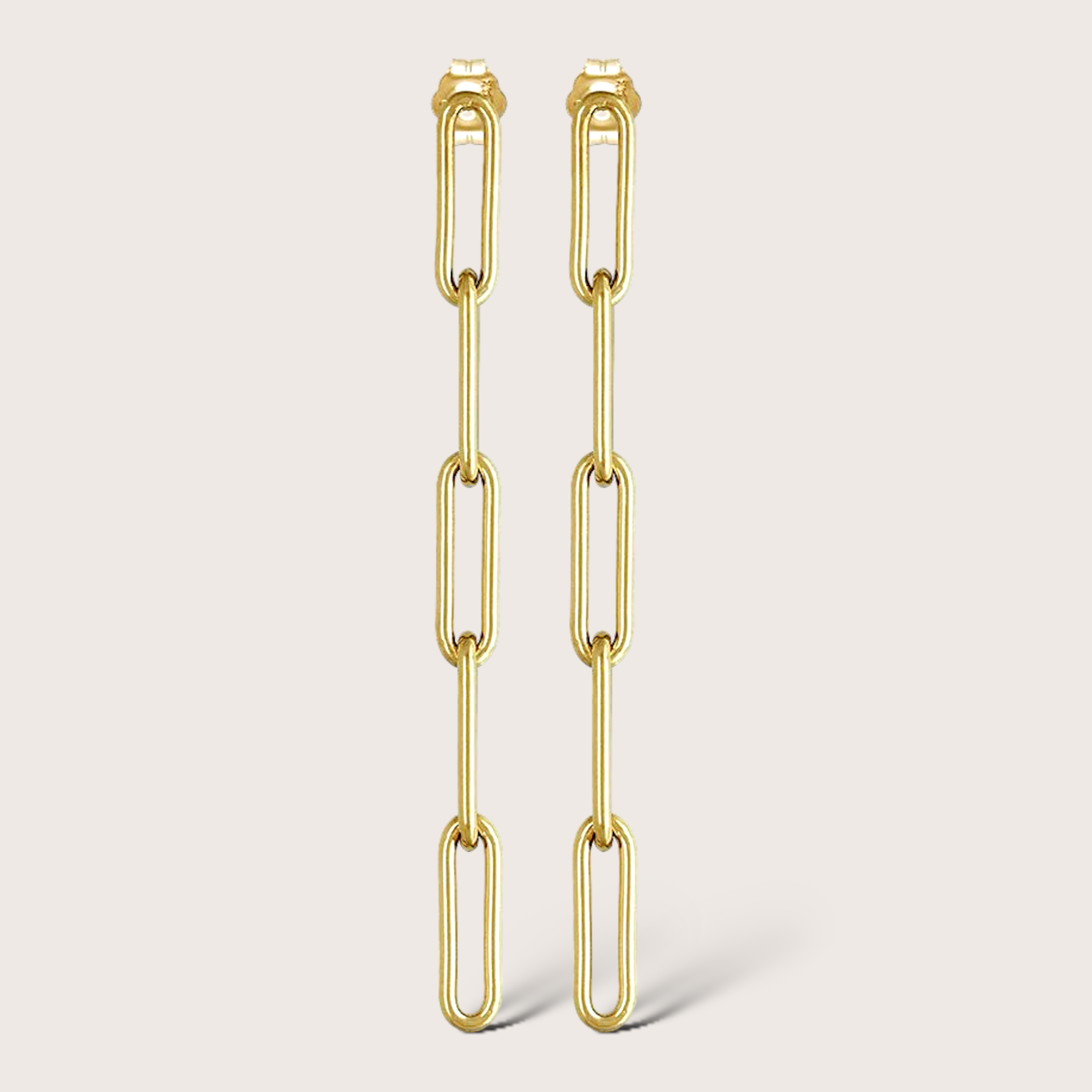 Modern 5-link paperclip dangle stud earrings shown in 14K gold filled by Ashley Nicole Jewelry.