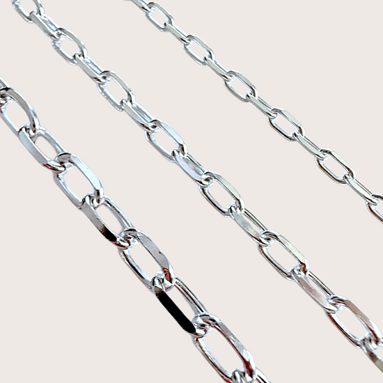 Close up video of  solid 925 sterling silver mariner  link chains in a hand by AshleyNicole Jewelry