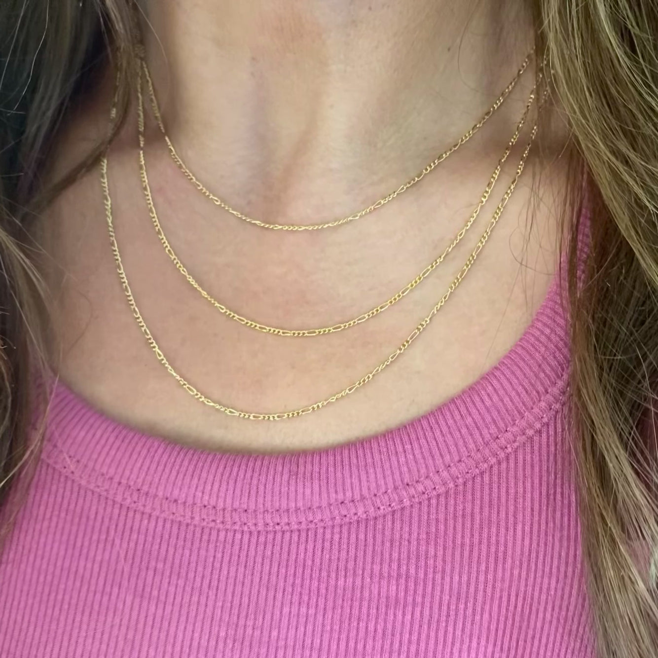 Model wearing necklaces showing a visual for length examples offered.