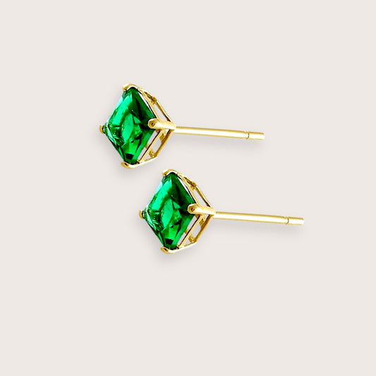 Side angle of solid 14K emerald princess square cut stud earrings