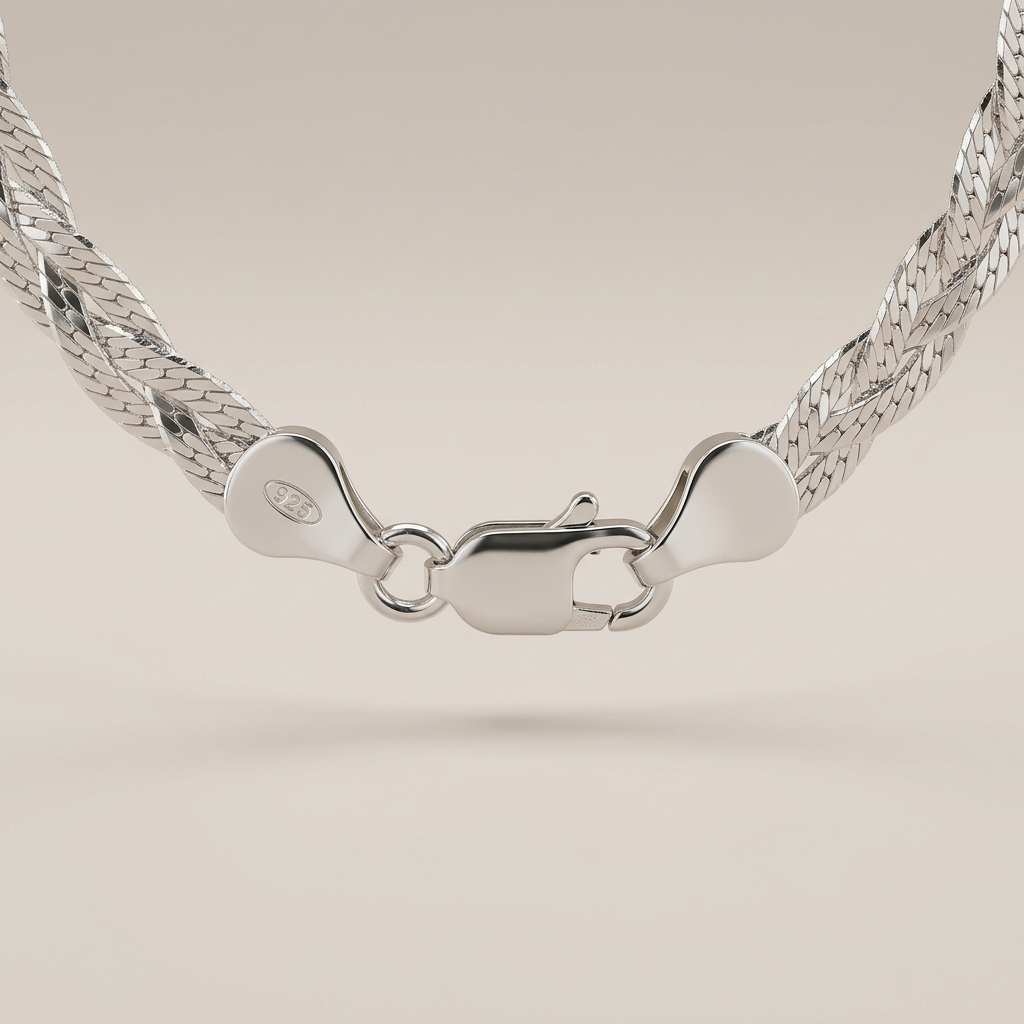 Sterling silver braided herringbone necklace clasp studio close-up