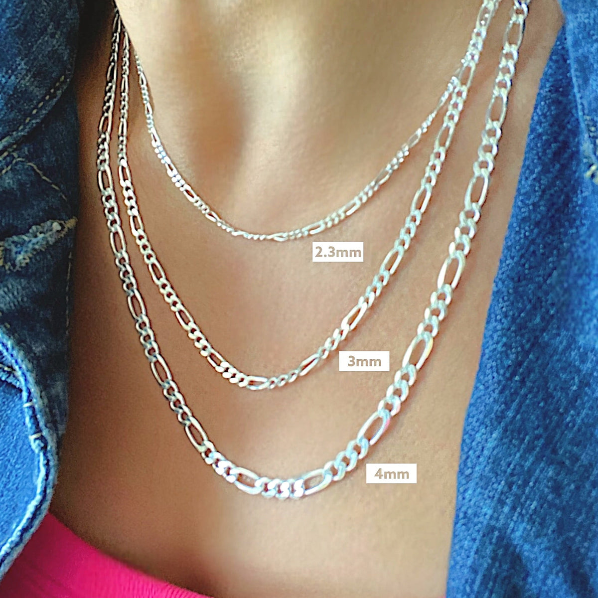 Sterling Silver Figaro Chains shown in 2.3mm 3mm and 4mm widths layered in different lengths.