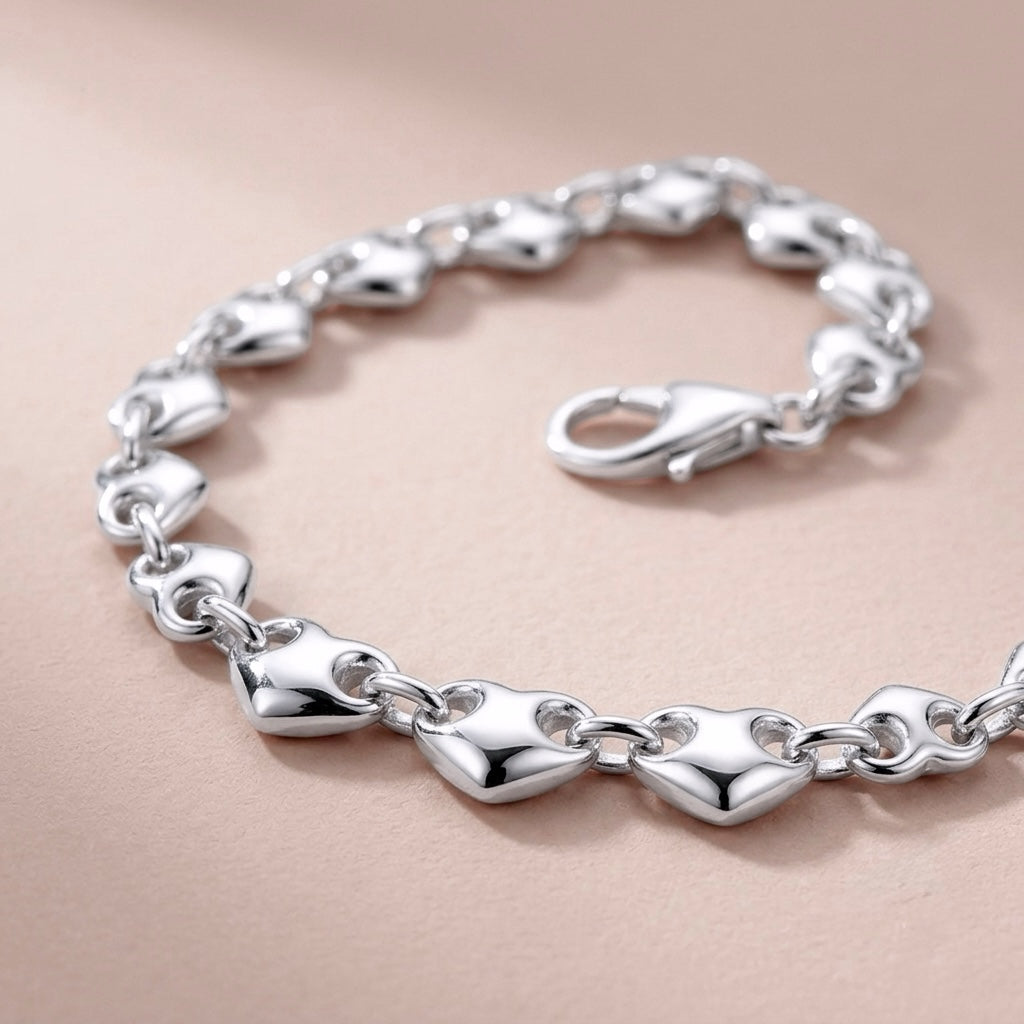 close up of the 8mm thick heavy sterling silver puffed mariner links bracelet by Ashley Nicole Jewelry