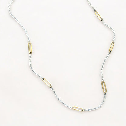 Close-up of 2mm diamond-cut sterling silver cable chain with evenly spaced 14K gold-filled paperclip links